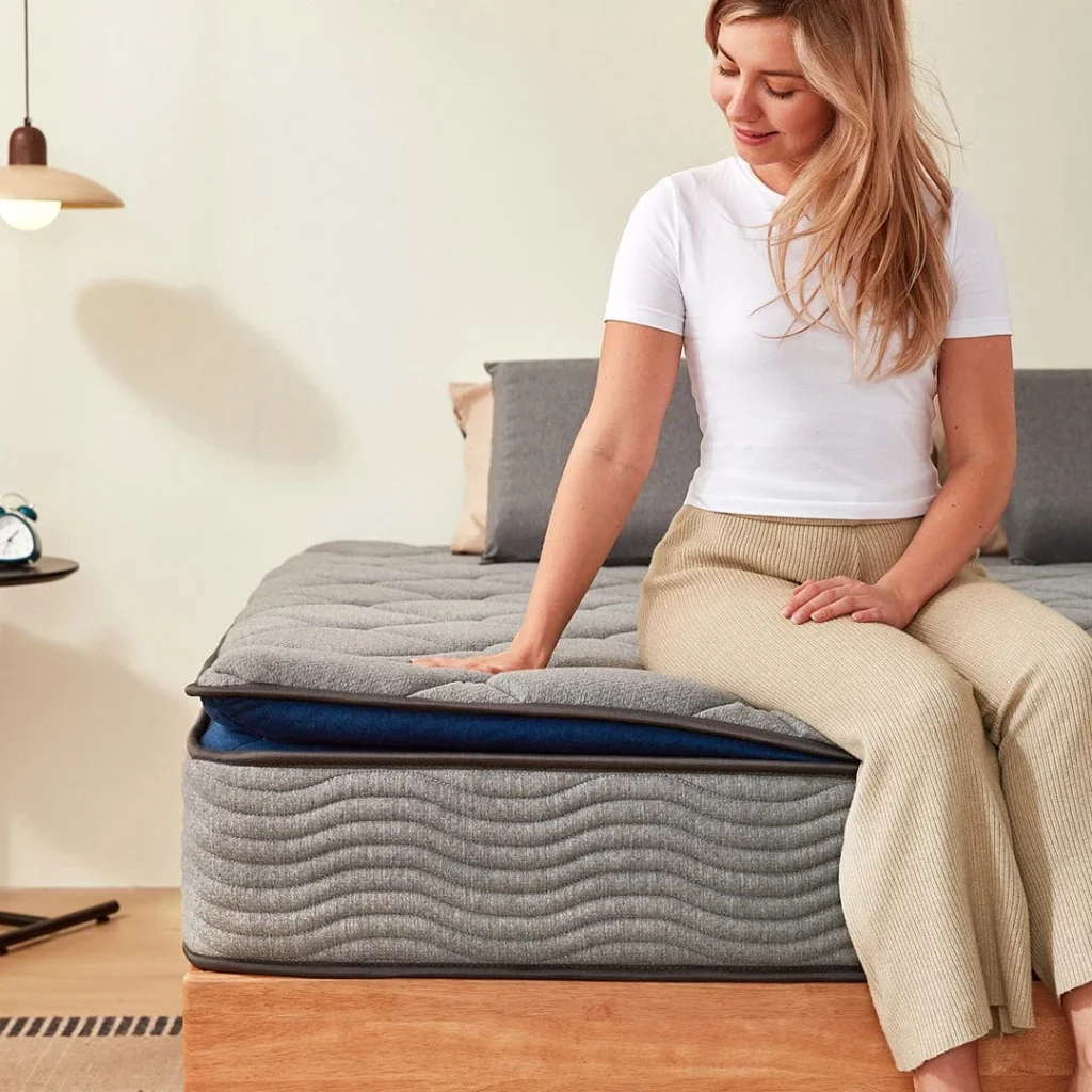 Newentor Hybrid Mattress Pro on a timber bed base, shown from the side